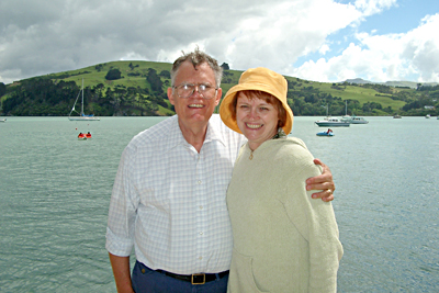 A 2004 photo of my husband and I looking out at Akaroa harbor. The village of Akaroa is on the Banks Peninsula about 52 road miles southeast of Christchurch, Canterbury, New Zealand.
