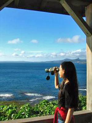 An image of girl with binoculars.