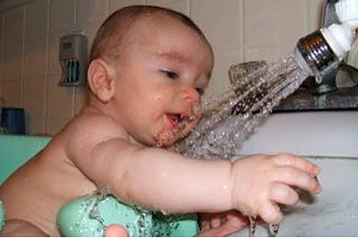 An image of a baby in a bath.