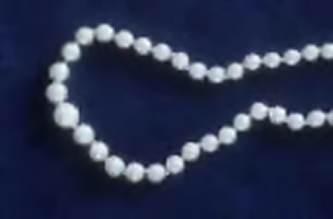 An image of a pearl necklace.