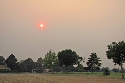 A smoky sunset as viewed from Albuquerque’s Arroyo del Oso Golf Course on Tuesday, June 7, 2011.