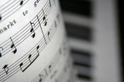 An image of musical notes and a piano.