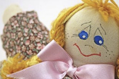 A photo of a disappointed doll.