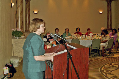 A photo of Mary speaking in El Paso, Texas.