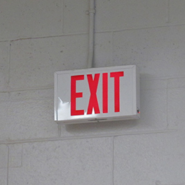 A photographic image of an exit sign.