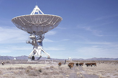 A photographic image of a radio telescope at the Very Large Array between Datil and Magdalena, New Mexico.