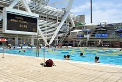 A photographic image of a large swimming pool.