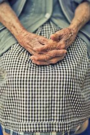 A photographic image of the arthritic hands of an elderly woman.