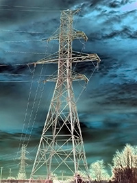 A photographic image of an electrical transmission tower.