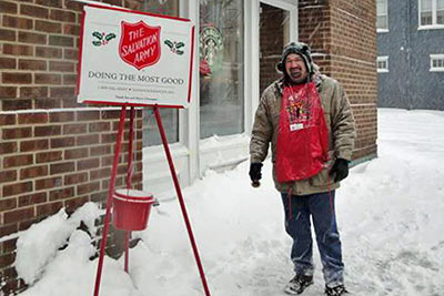 A photographic image of a Salvation Army Bell Ringer.