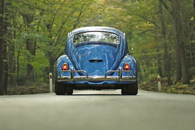 A photographic image of a blue Volkswagen.