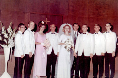 Morris and Mary Webb and the wedding party in church.