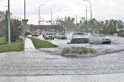 A photographic image of a flooded road.