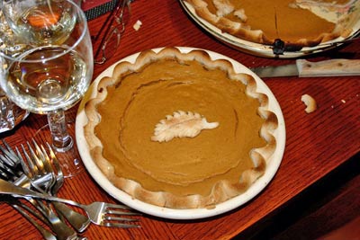 A photographic image of baked pumpkin pies.