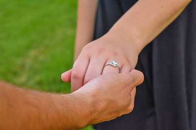 A photographic image of an engagement ring.