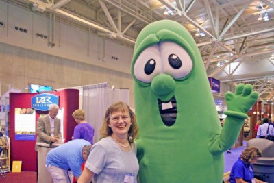 Mary meets Larry the Cucumber from Veggitales.